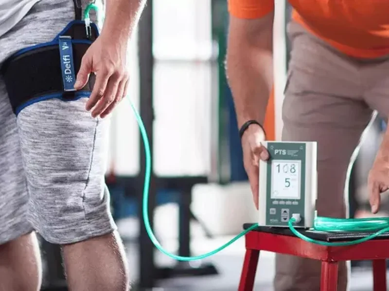 Patient performing progressive strength training under supervision
